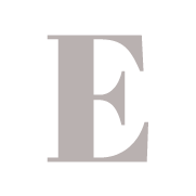 A stylized capital letter "E" is shown in a serif font, colored in light pink against a teal background.